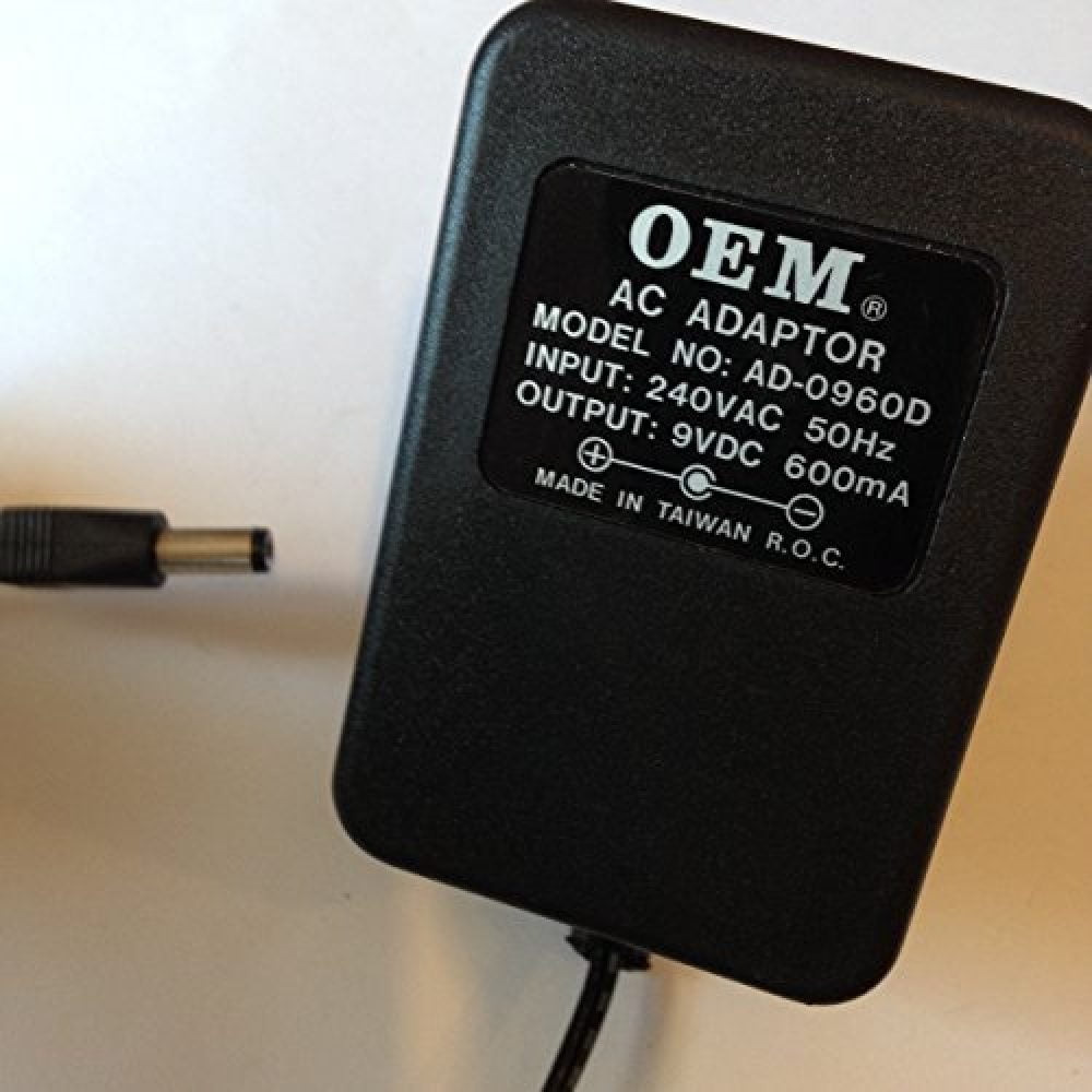 OEM AC ADAPTOR, 9V, 600MA, AD0960D, REVERSE POLARITY, LOT REF 54